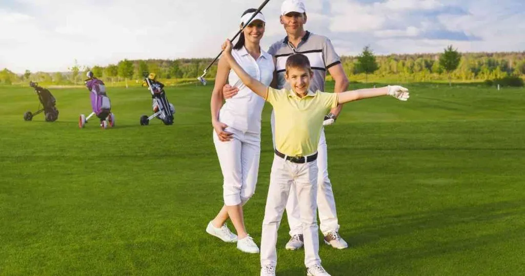 family playing golf