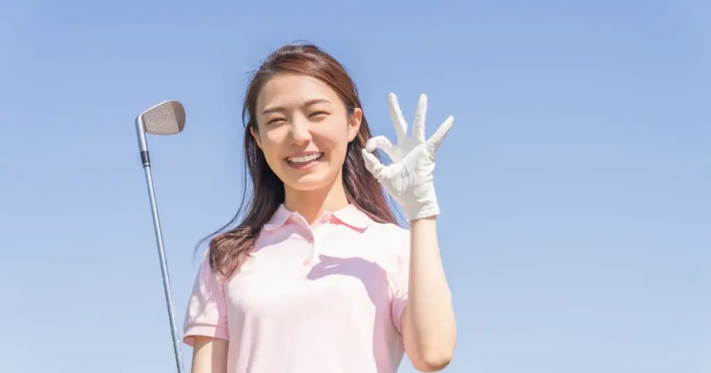 Cheerful asian woman who golf player 